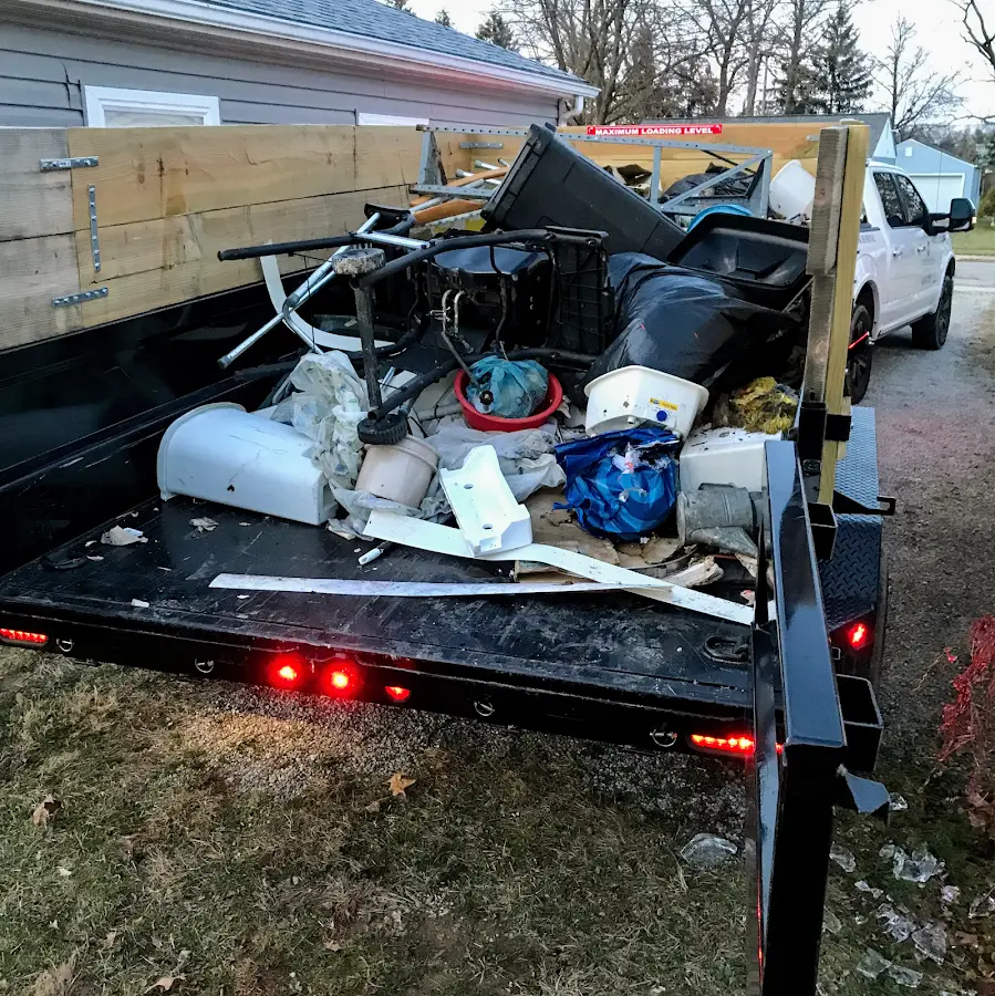 Roll-off dumpster delivered to a residential driveway in Knox
