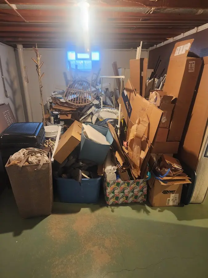 Roll-off dumpster container at job site for 8 Yard Dumpster Rental in Knox